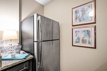 a kitchen with stainless steel appliances at 701 South Apartments in Mobile, AL